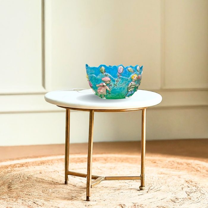 Decorative ceramic bowl with storytelling details.