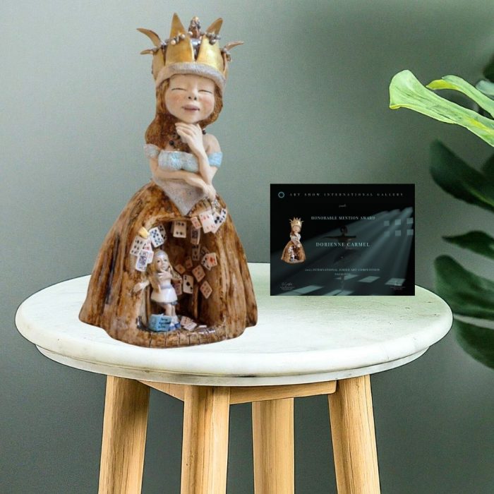 Handmade ceramic sculpture depicting the Queen and Alice from Lewis Carroll's "Alice's Adventures in Wonderland."