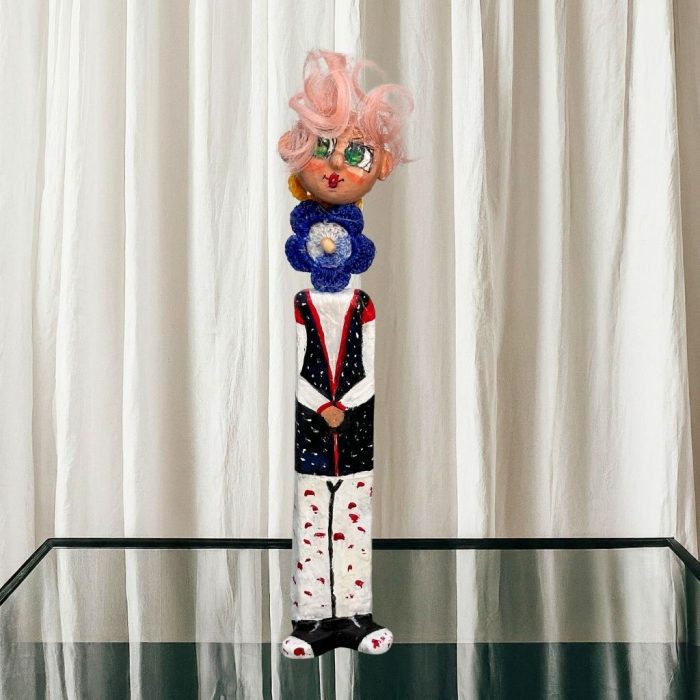 Artistic ceramic figure blending functionality, creativity, and charm.