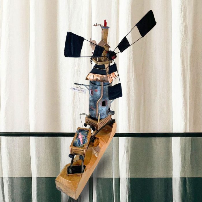Artistic windmill and goods vehicle sculpture with nostalgic charm
