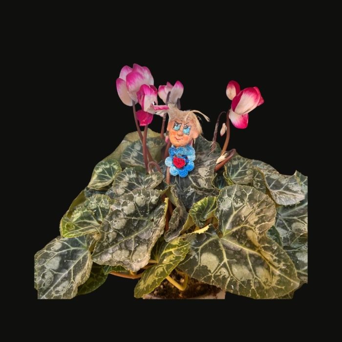 A themed ceramic body supports a stainless steel rod-mounted character head.