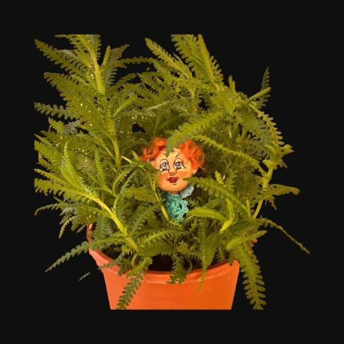 A unique ceramic planter featuring a playful theme and interchangeable parts.