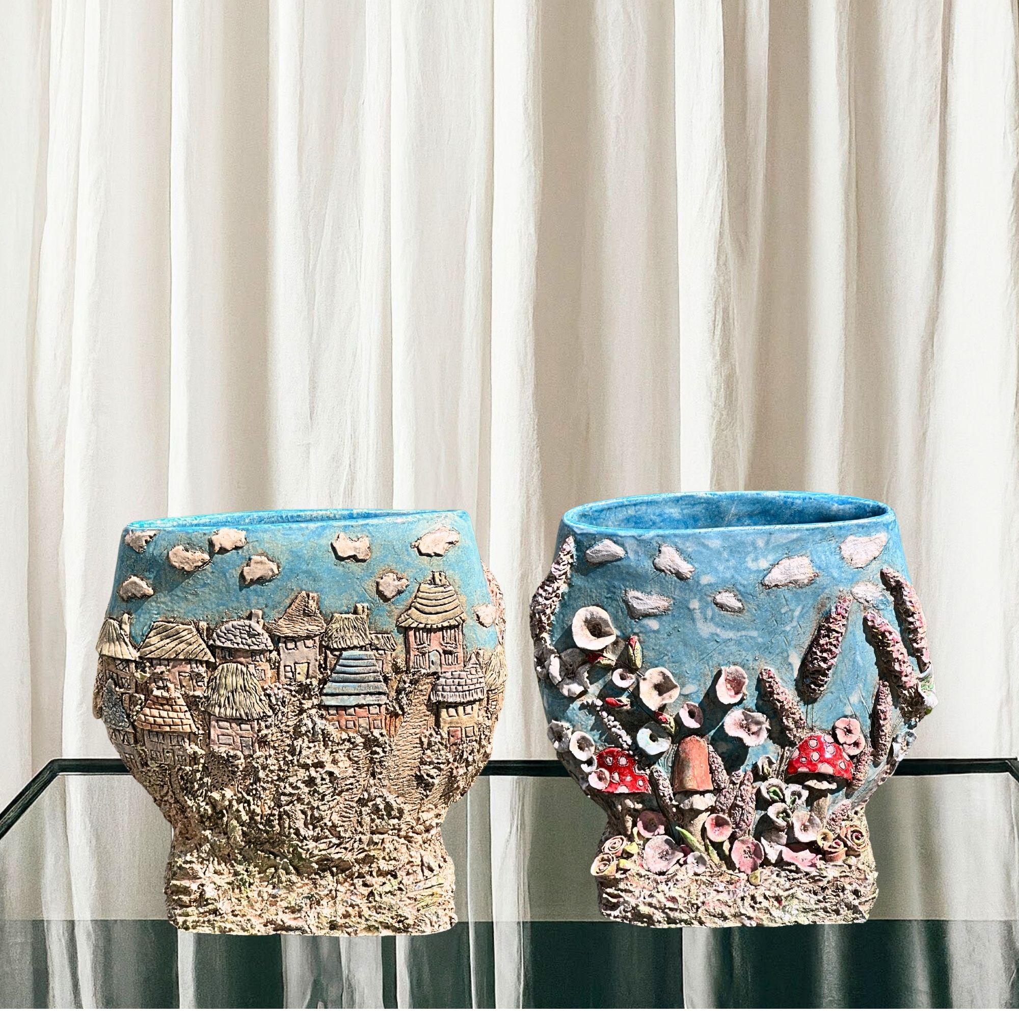 Award-winning handmade 3D ceramic planter with textured houses and flowers